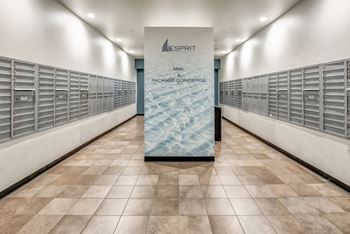 A long hallway with a sign that says 